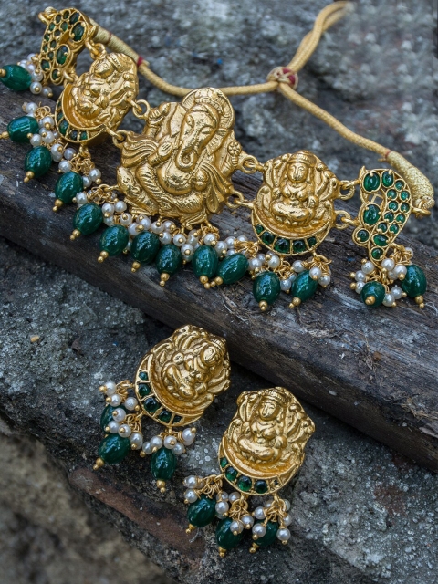 

Alankruthi Women Gold-Plated Green Stone-Studded & Beaded Temple Jewellery Set