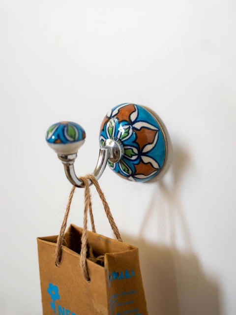 

Neerja Multicoloured Handmade Ceramic Round Wall Hook, Multi