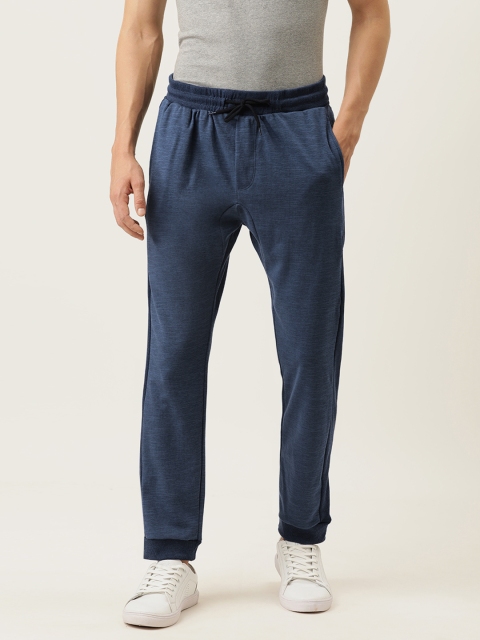 

Campus Sutra Men Navy Blue Solid Straight Fit Track Pants With Side Stripes