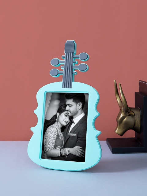 

Golden Peacock Turquoise Blue Solid Guitar Shaped Photo Frame