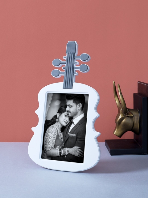 

Golden Peacock White & Grey Guitar Shaped Table Photo Frame