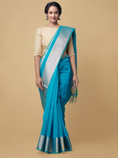 

Unnati Silks Blue & Green Zari Sustainable Silk Cotton Baluchari Saree