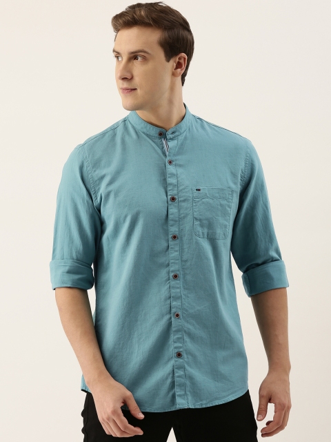 

Peter England Casuals Men Blue Solid Slim Fit Casual Shirt