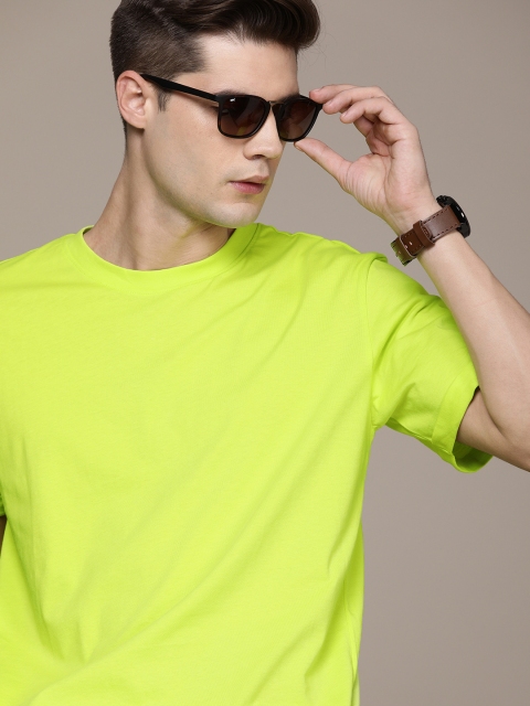 

Calvin Klein Jeans Men Green Solid T-shirt