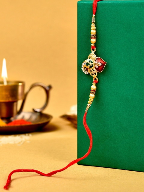 

Zaveri Pearls Red & Green Enamelled Lord Ganesha Rakhi With Chawal Roli