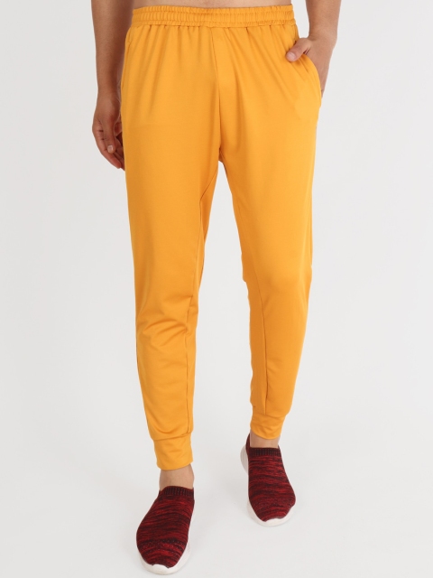 

VEGA Men Mustard Yellow Solid Slim-Fit Rapid-Dry Joggers