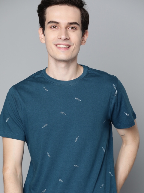 

Mast & Harbour Men Teal Blue & White Printed Pure Cotton T-shirt