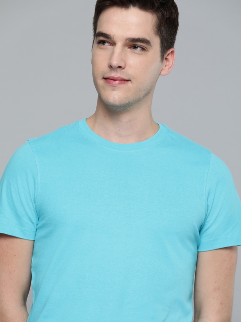 

Mast & Harbour Men Blue Solid Handcrafted Cotton T-shirt