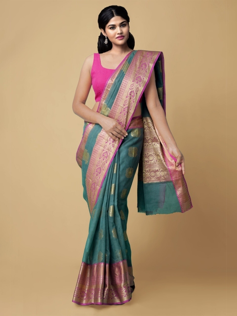 

Unnati Silks Teal & Pink Ethnic Motifs Woven Design Zari Silk Blend Kota Banarasi Saree