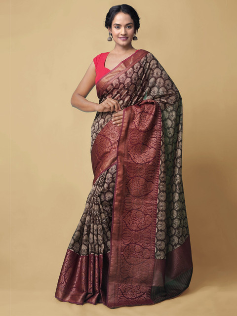 

Unnati Silks Brown & Maroon Ethnic Motifs Silk Cotton Sustainable Maheshwari Saree