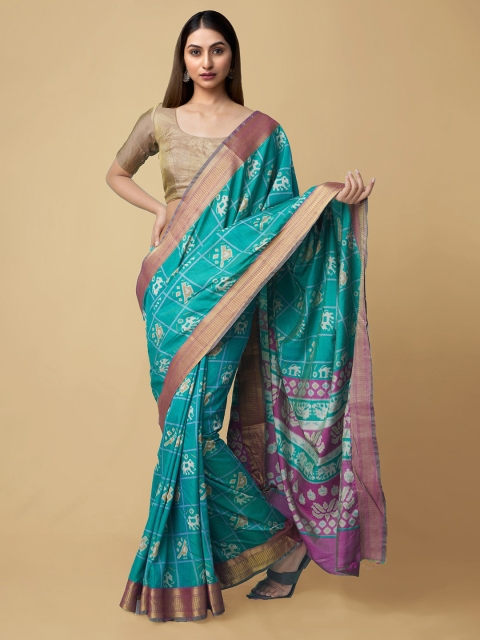 

Unnati Silks Teal Blue & White Art Silk Patola Saree
