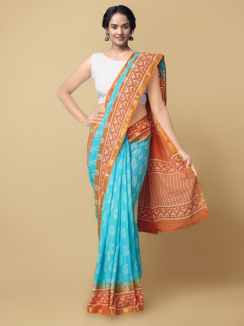 

Unnati Silks Turquoise Blue & Orange Ethnic Motifs Pure Cotton Block Print Saree
