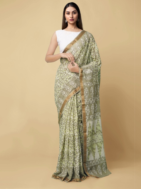 

Unnati Silks Green & White Dabu Pure Cotton Dabu Saree