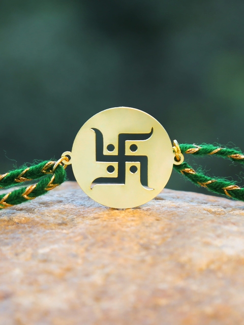 

Bigsmall Gold-Toned Swastika Metallic Rakhi