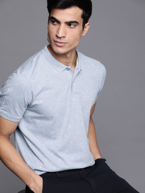 

Louis Philippe Sport Men Blue & Fluorescent Green Geometric Print Polo Collar T-shirt