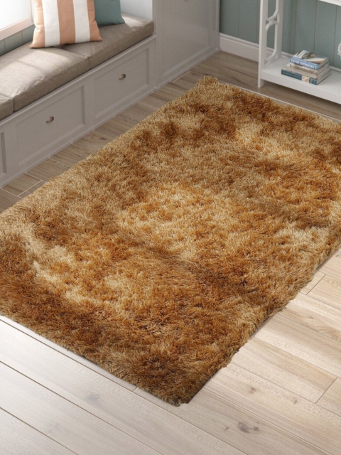 

SANDED EDGE Copper-Coloured Solid Handcrafted Shaggy Carpet