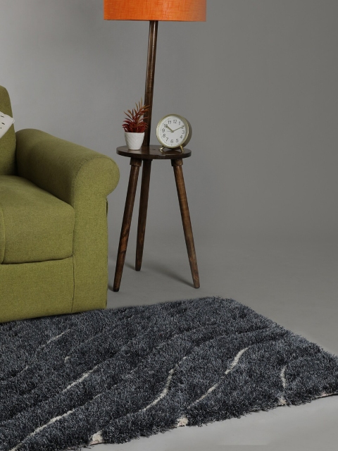 

SANDED EDGE Blue Solid Shaggy Carpet