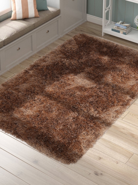 

SANDED EDGE Brown Solid Shaggy Handcrafted Carpet