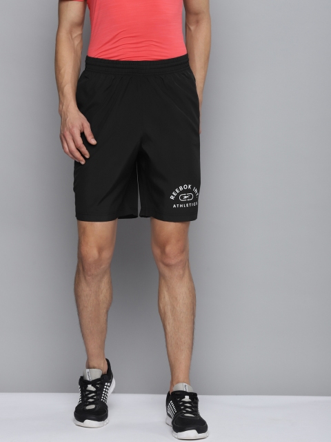 

Reebok Men Black Solid Training Wor Woven Shorts