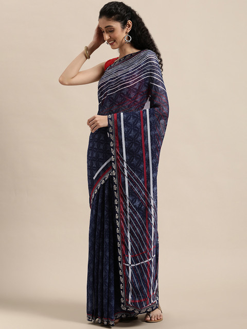

Triveni Blue Printed Pure Georgette Saree