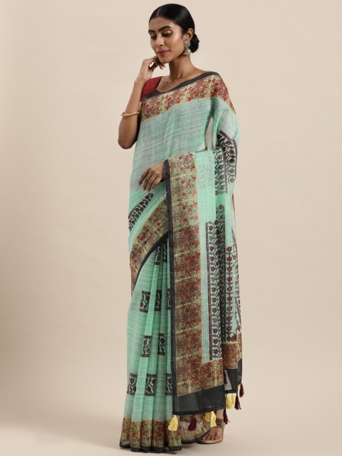 

Triveni Sea Green Floral Art Silk Saree