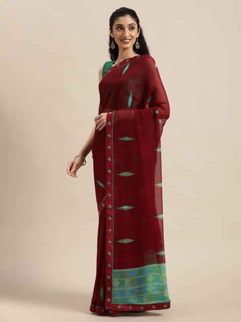 

Triveni Burgundy & Green Printed Pure Georgette Saree