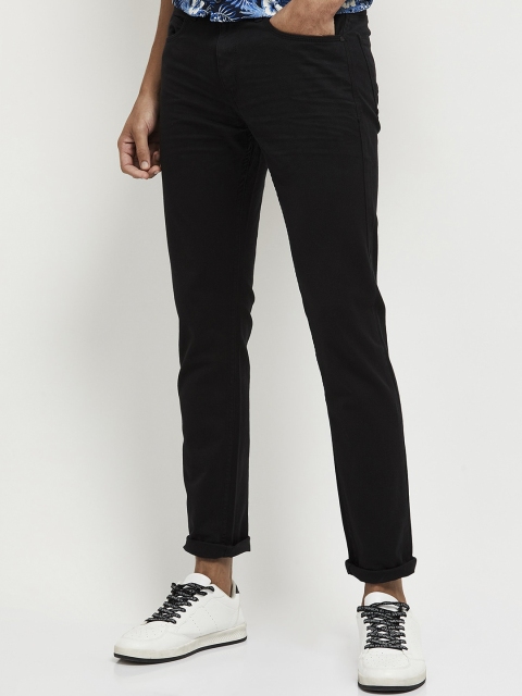 

max Men Cotton Black Solid Jeans