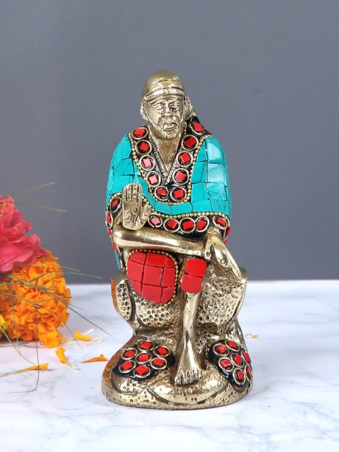 

Aapno Rajasthan Gold-Toned & Red Handcrafted Sai Baba Statue Showpiece