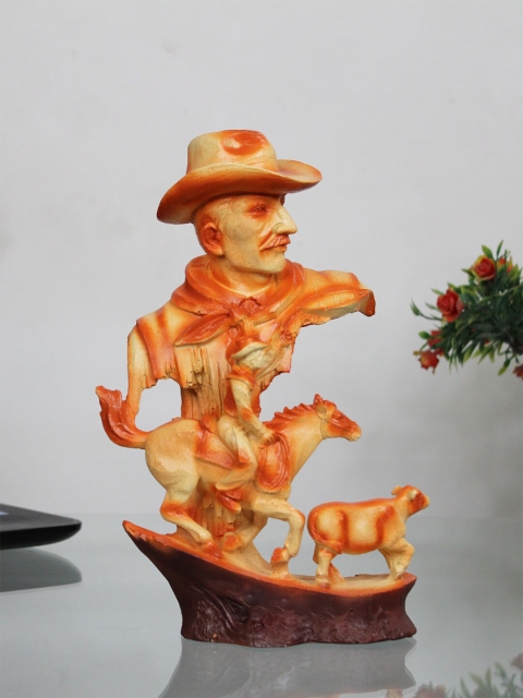 

Wonderland Orange Small Cowboy Statue for Table Top