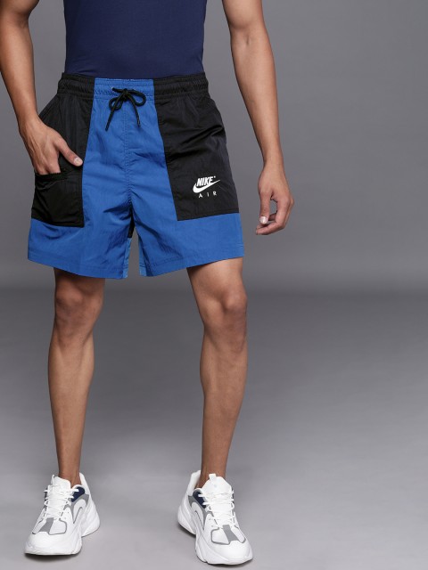 

Nike Men Blue & Black Colourblocked Mid-Rise Regular Shorts