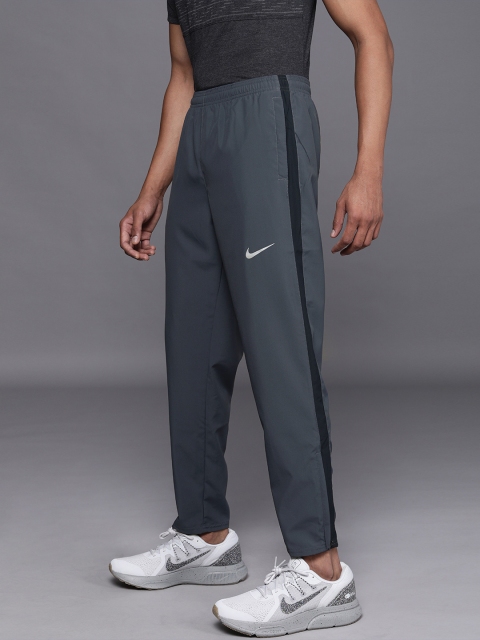 

Nike Men Grey Run Stripe Woven Running Track Pants