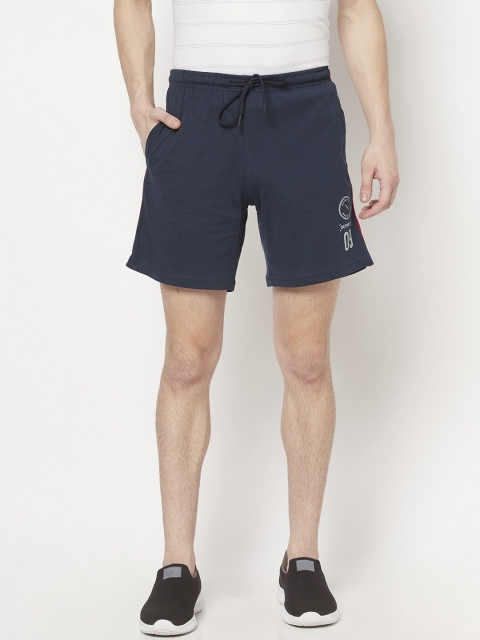 

Octave Men Blue Solid Mid-Rise Sports Shorts