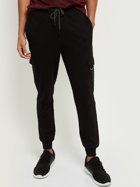 

max Men Black Solid Joggers