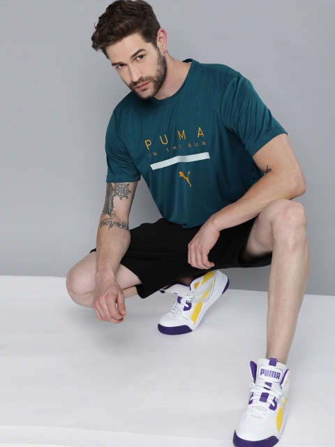 

Puma Men Teal Blue & Yellow RUN Logo Printed Drycell RunningT-shirt
