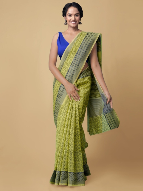 

Unnati Silks Green & Blue Floral Supernet Kota Sustainable Saree