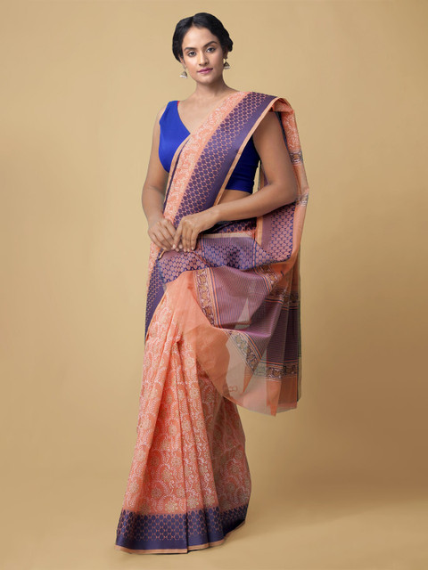 

Unnati Silks Peach-Coloured & Blue Floral Printed Sustainable Supernet Kota Saree