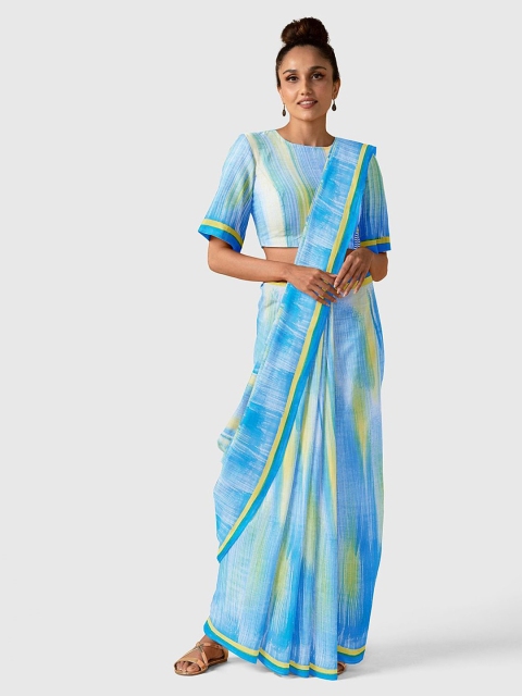 

Taneira Blue & White Handpainted Pure Cotton Saree