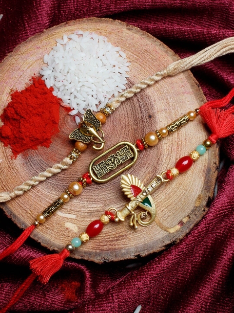 

Shoshaa Men Set Of 3 Peacock & Lord Ganesha Thread Handcrafted Rakhi With Roli Chawal, Gold