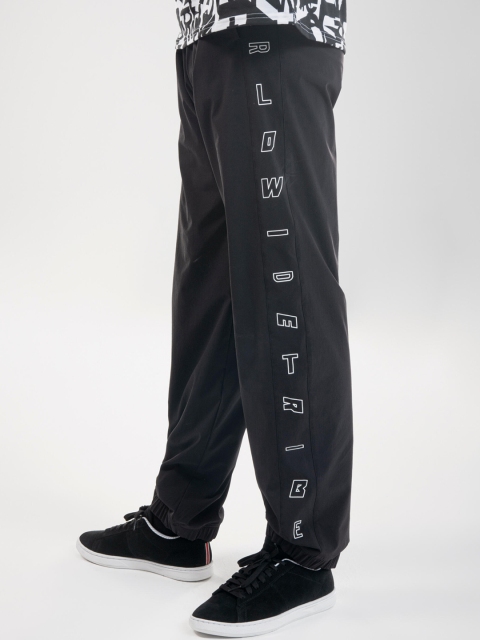 

Domyos By Decathlon Men Black Solid Loose Fit Urban Look Fitness Dance Track Pants