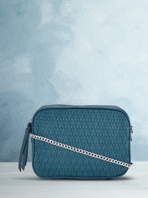 

Forever Glam by Pantaloons Teal Textured Swagger Sling Bag With Tasselled Detailing