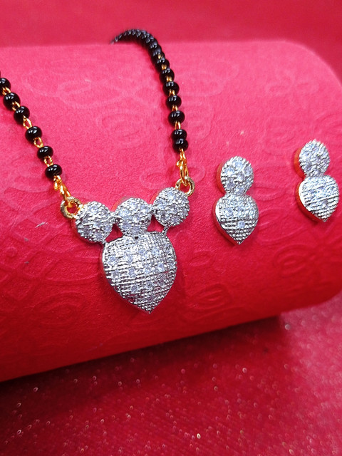 

OOMPH Silver Toned & Black American Diamond Heart Love Mangalsurta & Earrings Set
