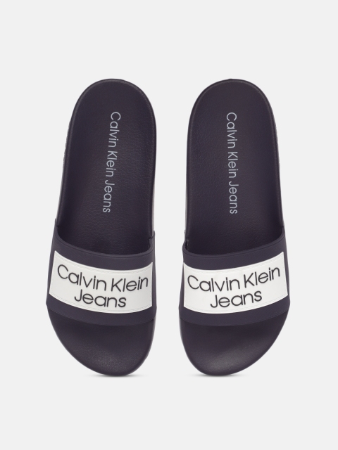 

Calvin Klein Men White & Navy Blue ALEXIS Brand Logo Self-Design Sliders