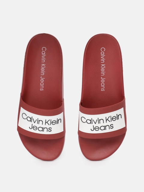 

Calvin Klein Men Red & White Self Design Sliders