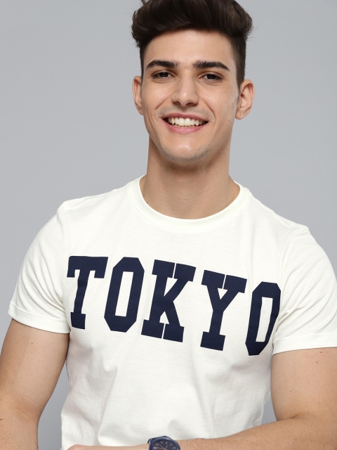 

Mast & Harbour Men Off-White & Navy Blue Cotton Typography Printed T-shirt