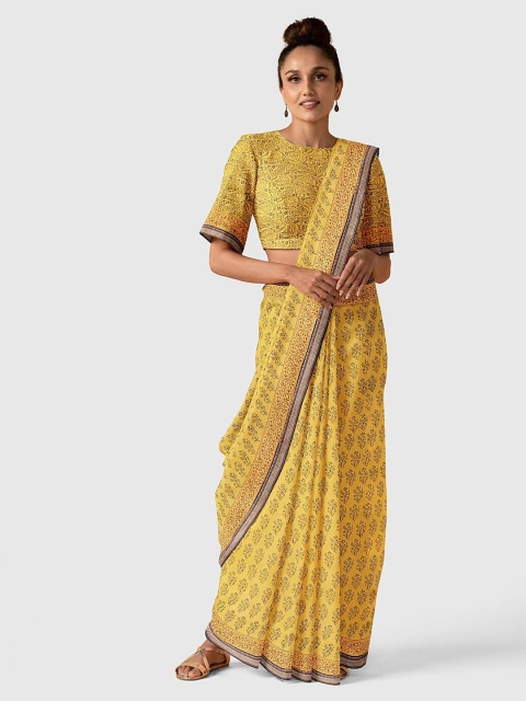 

Taneira Yellow & Black Ethnic Motifs Silk Cotton Bagh Saree
