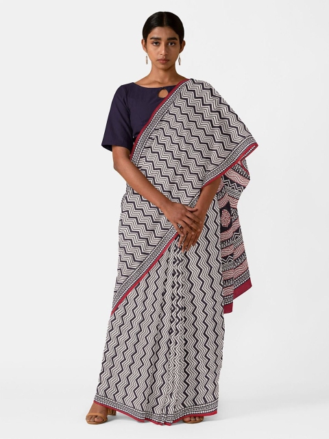 

Taneira White & Black Pure Cotton Bagru Saree