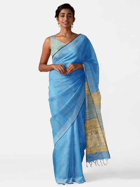 

Taneira Turquoise Blue & Beige Silk Blend Bhagalpuri Saree