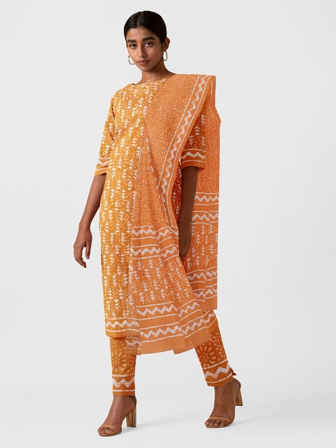 

Taneira Orange & White Printed Pure Cotton Unstitched Dress Material