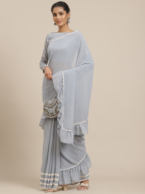 

Sangria Blue Solid Ruffled Saree with Embroidered detail