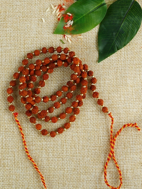 

Aapno Rajasthan Brown Rudraksha Handcrafted Mauli Rakhi